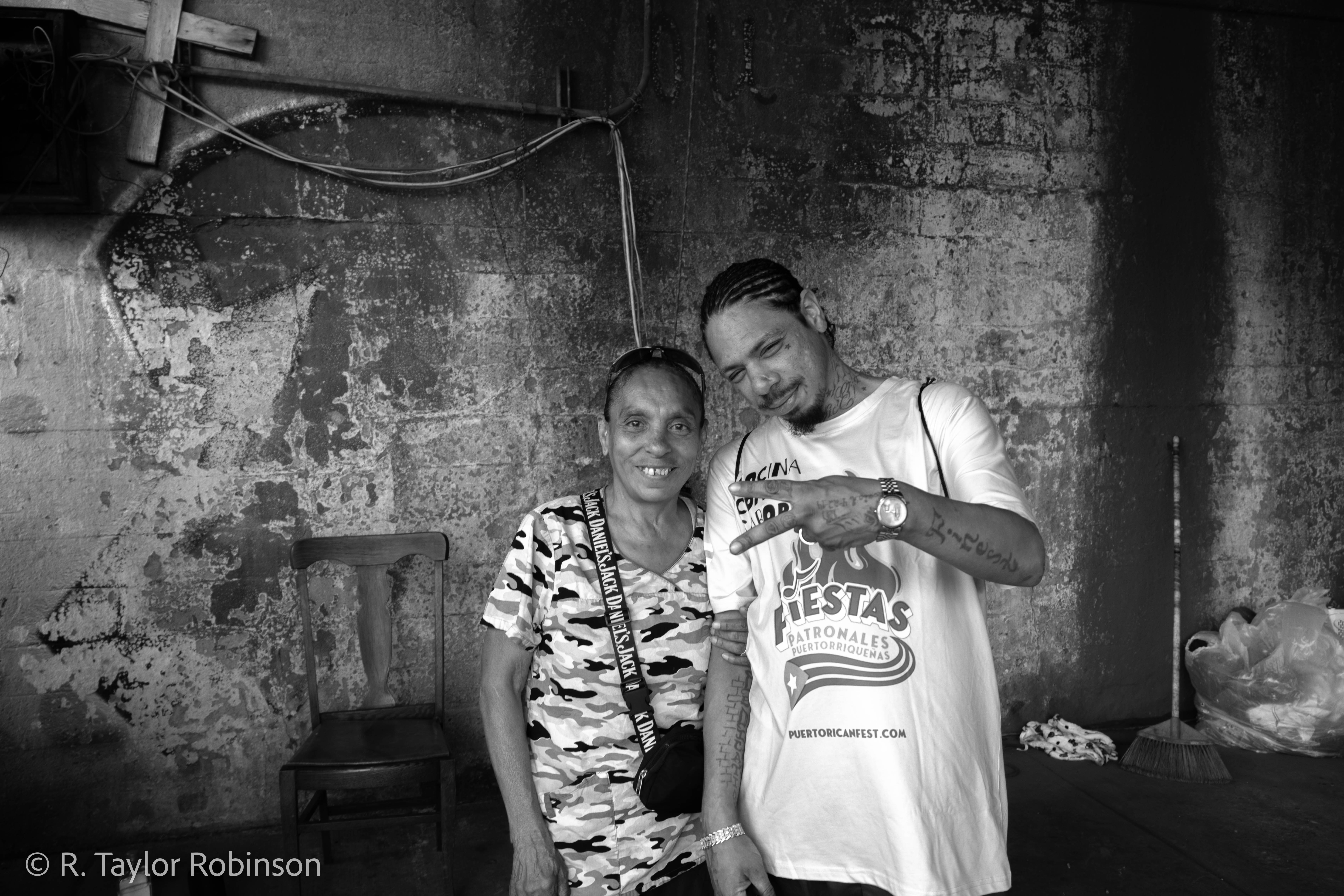 Gonzalez poses with his long-time friend Maria, 70, who lives in a house just up the way and went to the same high school as him when she was in school. Gonzalez said he wants to be a neurologist and find a cure for epilepsy. "When I went to Malcolm X college I was studying chemistry and biology, but they said if I wanted to become a neurologist I had to get an MD," Gonzalez said. "My GPA was 3.9 and I was taking all the tough classes."