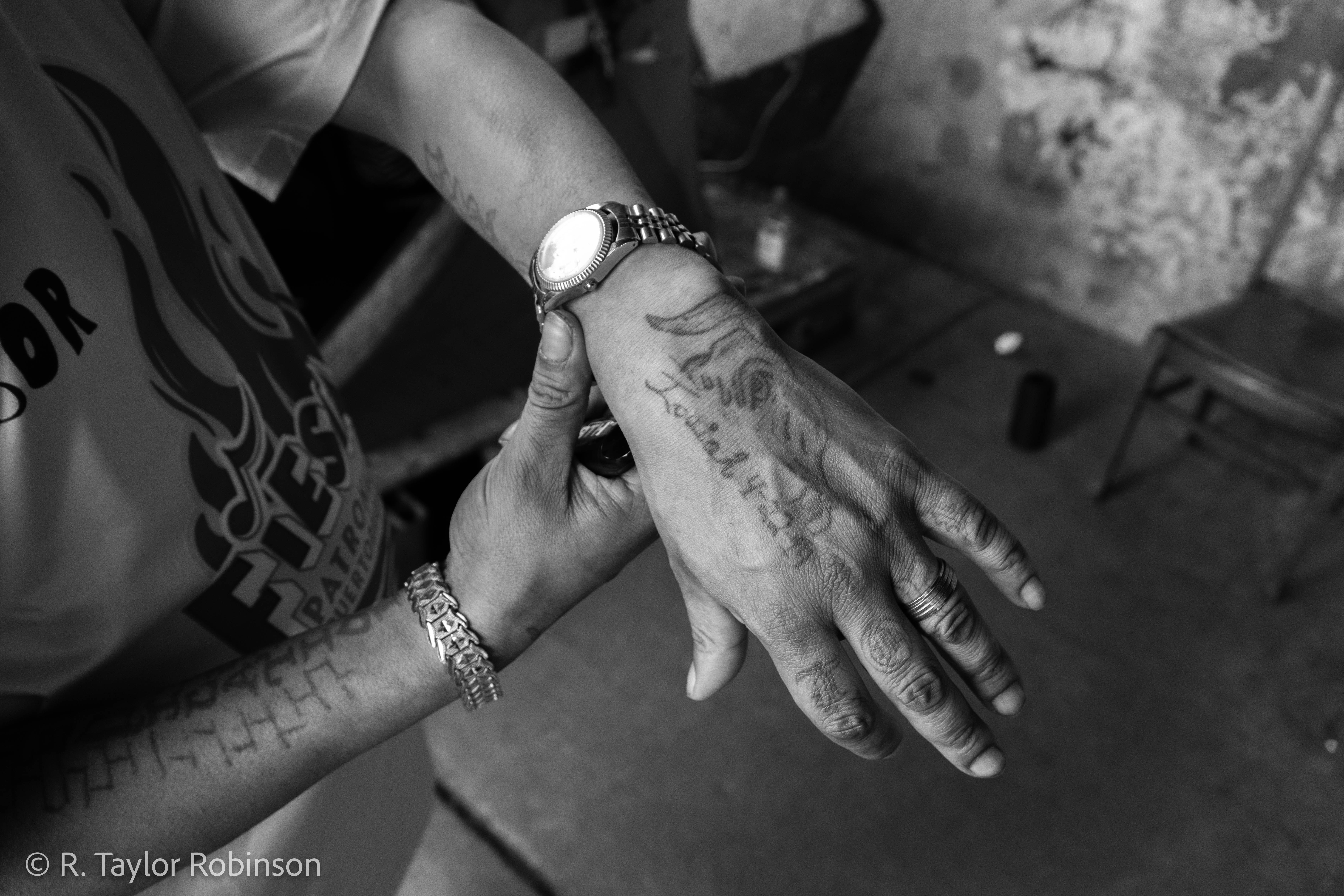 Gonzalez shows his hand tattoo of his son’s name, birthday and star sign (Taurus). He has the same tattoo for his daughter on his other hand. He just saw the two of them and his stepson the week before and gave them birthday presents: $200 to his son, $100 to his daughter and $50 to his stepson.