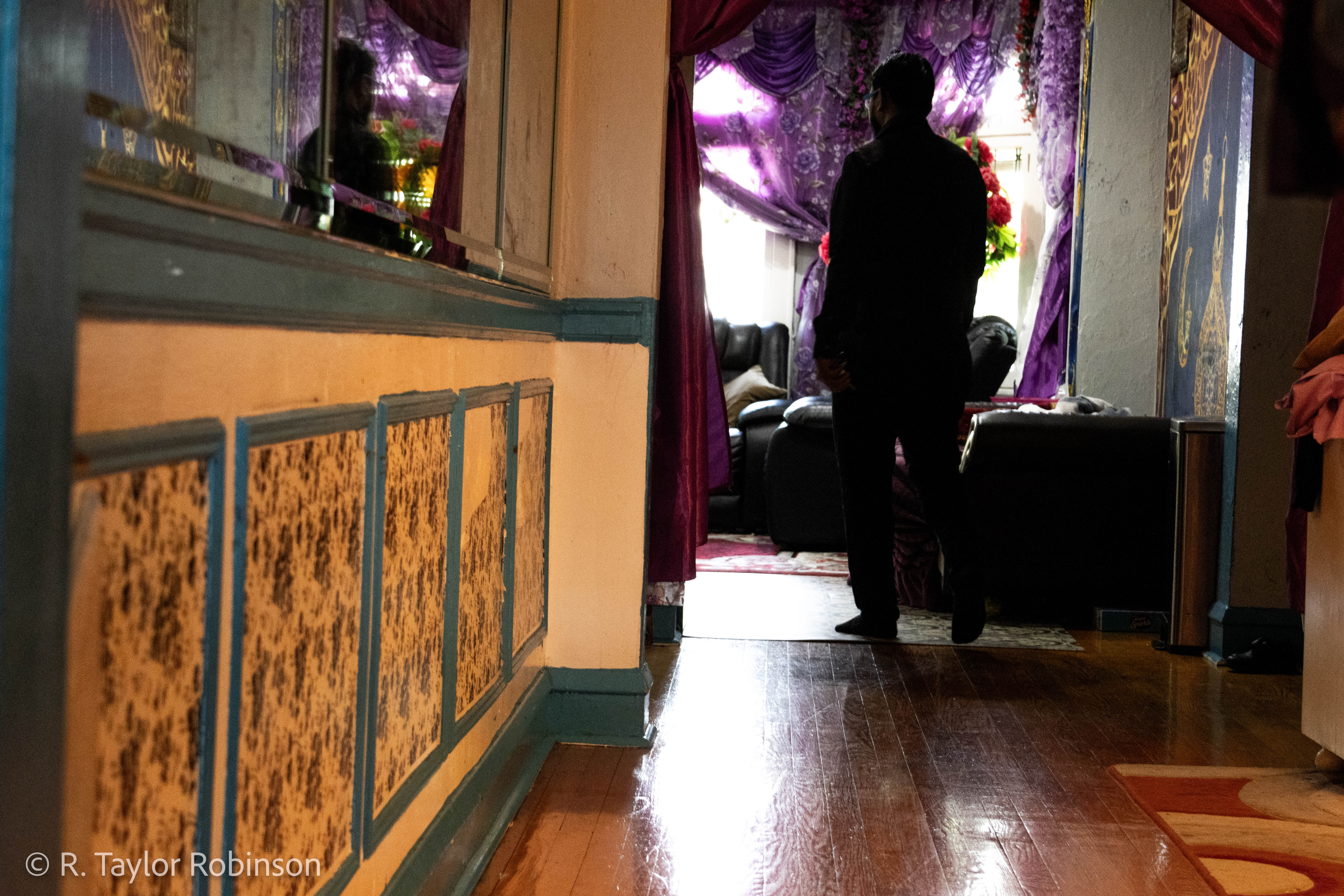Kamal walks through the upstairs hallway back to the living room, his kids will be arriving back from school soon. After 27 days lost at sea with no fuel, a great wind blew them into Sri Lankan waters where they were eventually picked up by the navy.